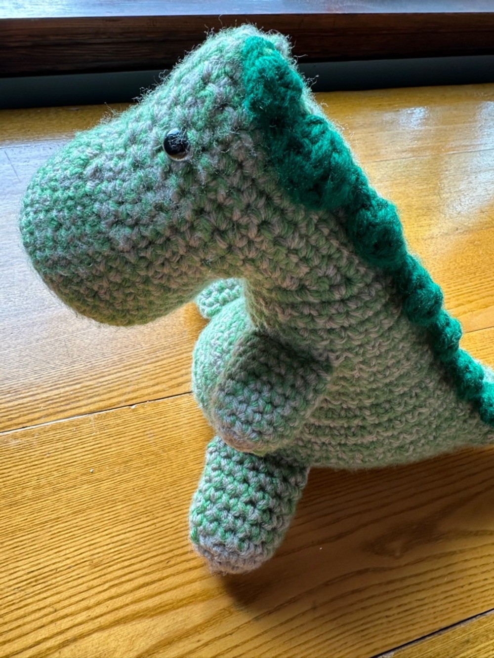 Handmade Crochet Dinosaur Plush in Light Green with Dark Green Spine
